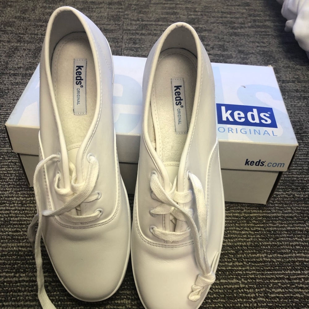 Brand new original leather “champion” tennies